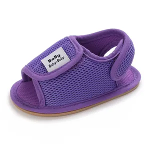 Detailed close-up of breathable purple mesh baby sandals featuring a soft rubber sole