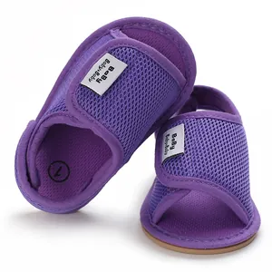 Detail of purple mesh baby sandals with breathable fabric and soft non-slip sole