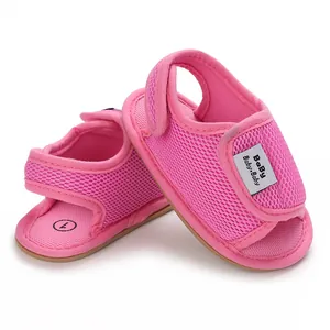 Detailed side view of breathable pink mesh infant walking sandals with soft anti-slip rubber sole