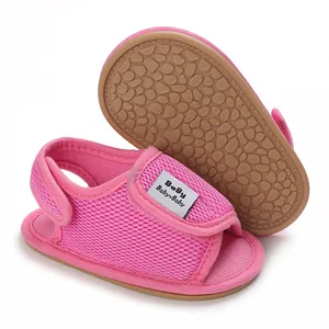 Detail view of pink baby sandals with breathable mesh and anti-slip pebble-pattern sole