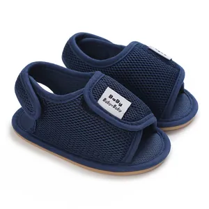 Close-up detail of navy blue breathable mesh baby sandals with soft non-slip rubber sole