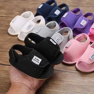 Detailed view of soft-soled breathable mesh baby walking sandals in various summer colors
