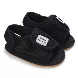 Breathable black mesh baby sandals with soft rubber sole and adjustable strap