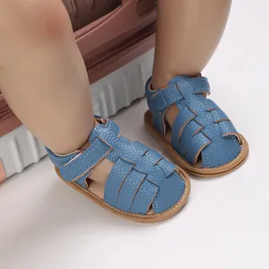 Macro detail view of blue soft-sole summer baby sandals with secure hook-and-loop closure