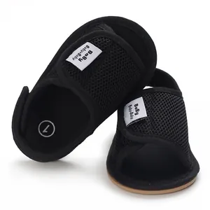 Detailed view of breathable mesh baby walking shoes with a soft non-slip rubber sole