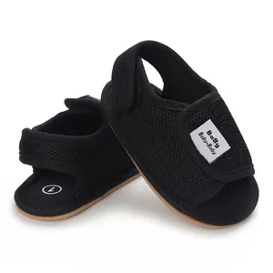 Detail view of breathable mesh baby walking shoes with soft rubber non-slip sole.