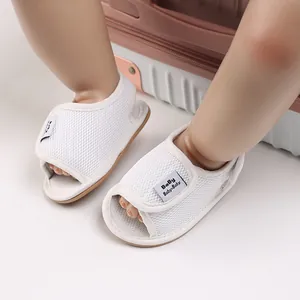 Detail view showing white breathable mesh baby walking shoes with soft anti-slip rubber soles