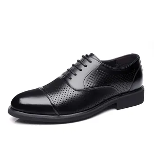 Elegant black men's perforated leather Oxford shoes for business formal occasions