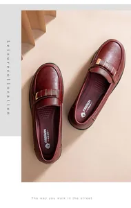 Comfortable burgundy flat loafers for women with soft sole and metal buckle