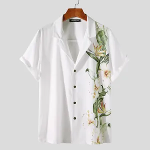 Detailed front view of white men's short sleeve shirt with tropical hibiscus print