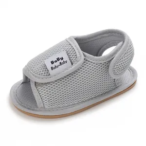 Close-up of grey breathable mesh baby sandal with soft rubber sole for pre-walkers