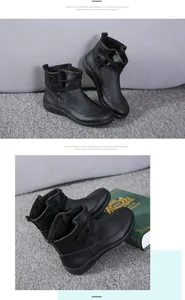 Stylish black leather ankle boots featuring side lace-up detail and warm fleece lining