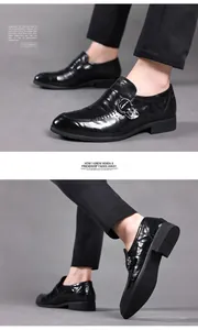 Detailed view of men's black leather dress shoes showing side profile and anti-slip sole