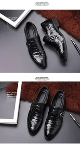 Detailed view of glossy black leather men's monk strap dress shoes with buckle