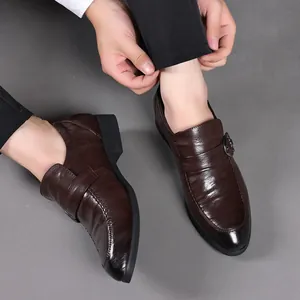 Elegant men's brown genuine leather formal business shoes with pointed toe and buckle detail.