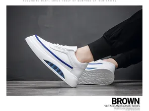 Zapatillas blancas casuales para hombre con cámara de aire azul y suela muy cómoda