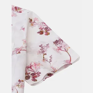 Macro view of floral print on men's short sleeve casual summer beach shirt