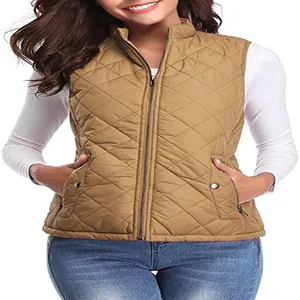 Close-up of women's khaki quilted vest with stand collar and functional zip pockets.