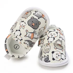 Chaussures de marche souples pour bébé avec motifs d'animaux et fermeture velcro