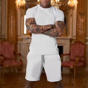 Detailed view of a men's white solid color short sleeve sports t-shirt and shorts set
