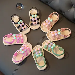 Selection of colorful toddler girls sandals with multi-color bows and elastic straps