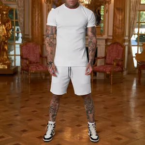 Full view of a white men's short-sleeve T-shirt and shorts set on a model.