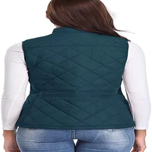 Back view of dark teal quilted puffer vest for women with stand collar for warmth
