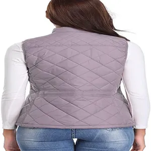 Back view of a women's lightweight purple quilted vest with diamond stitching