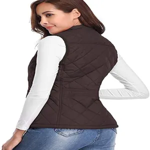 Back view of stylish brown diamond-quilted puffer vest with stand collar on female model.