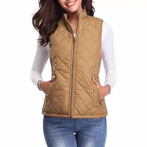 Classic women's camel quilted vest featuring a stand collar and functional zipper pockets