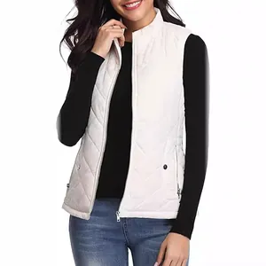 Women's white quilted puffer vest with stand collar and zipper pockets for winter.