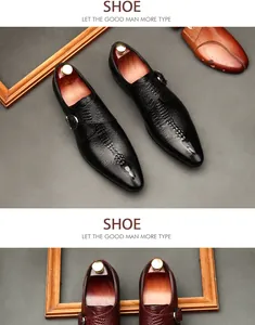 Close-up of men's monk strap leather shoes with embossed crocodile pattern