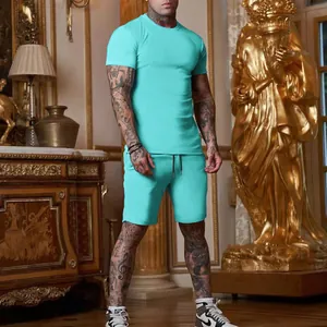 Detail view of men's turquoise summer sports set with slim fit t-shirt and shorts