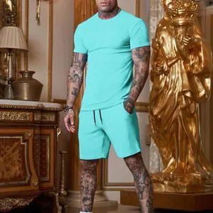 Men's athletic two-piece set featuring cyan short-sleeved tee and matching shorts