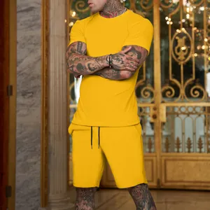 Men's bright yellow summer short sleeve T-shirt and sports shorts set worn by model