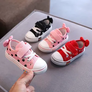 Adorable toddler girls polka dot canvas shoes with bow tie decor, soft sole baby walking shoes