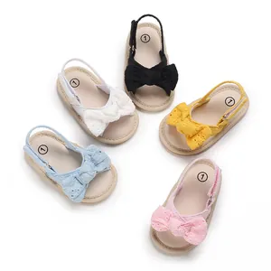 Detail view of breathable baby girl summer sandals with lace bows in five colors.