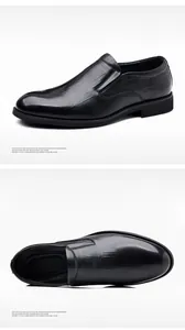 Close-up detail of men's black leather business shoes with crocodile pattern texture