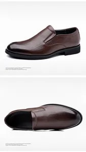 Detailed side and top-down view of men's brown crocodile embossed genuine leather loafers