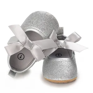 Silver glitter baby princess shoes with soft non-slip soles and elegant grey bows.