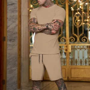 Close-up detail of khaki men's casual sports set featuring round neck T-shirt and drawstring shorts