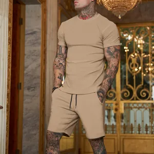Detailed view of men's solid khaki sports set showing slim fit T-shirt and matching shorts