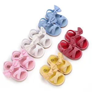 Soft-sole baby girl walking sandals with large bows in five vibrant summer colors