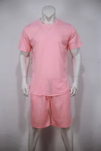 Men's casual pink solid color sports set featuring a short sleeve t-shirt and matching shorts