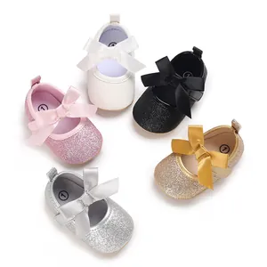 Set of colorful glitter baby girl princess shoes with large bows and soft anti-slip rubber soles