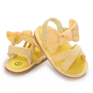 Yellow baby girl summer sandals with large bow knot and soft anti-slip rubber sole detail