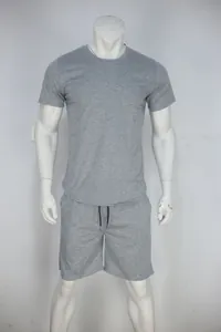 Detail shot of men's gray short sleeve t-shirt and drawstring shorts sports set