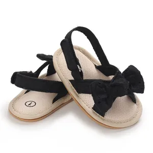 Comfortable soft sole baby girl sandals with breathable fabric and a decorative bow.