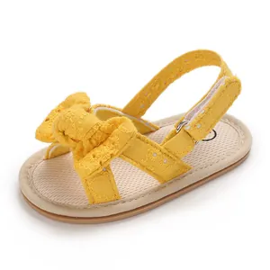 Yellow baby girl sandals with bow detail and breathable soft sole for summer walking