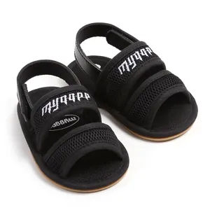 Detailed view of black breathable mesh baby sandals with soft rubber sole